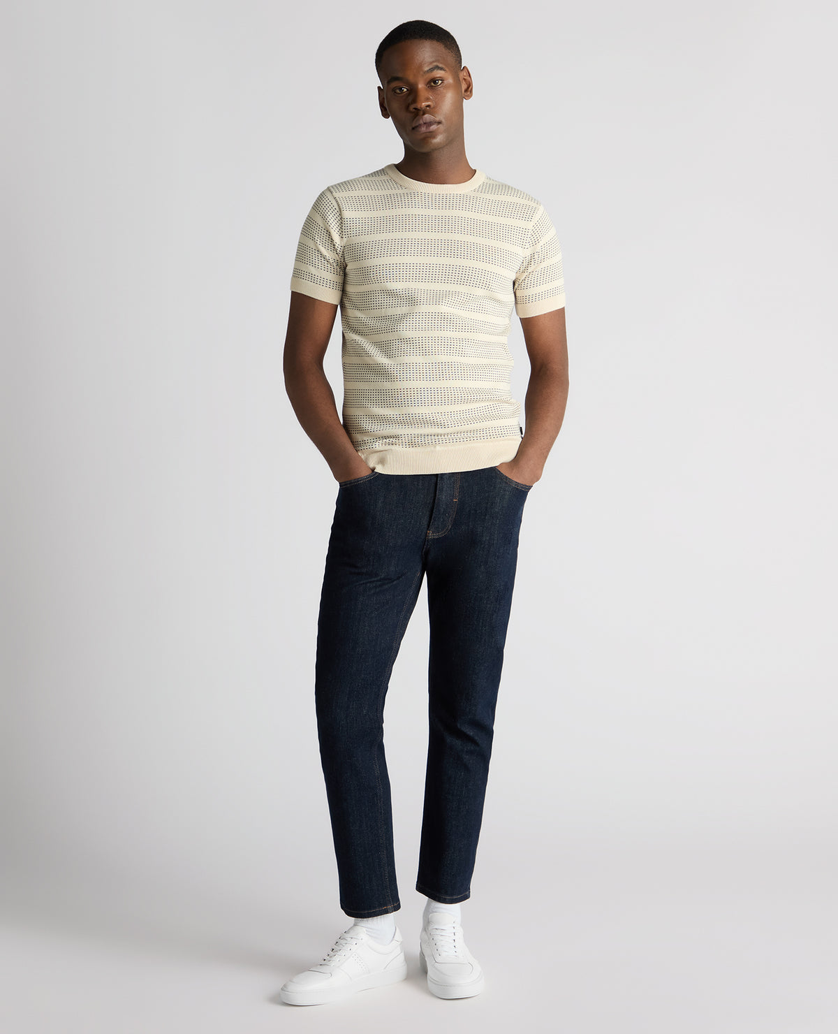 Man wearing a sand Slim Fit Jacquard Tee