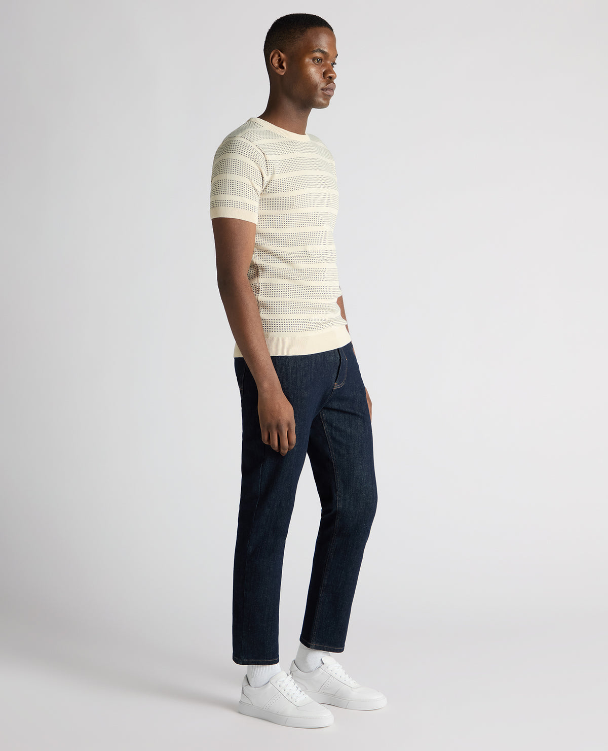 Man wearing a sand Slim Fit Jacquard Tee