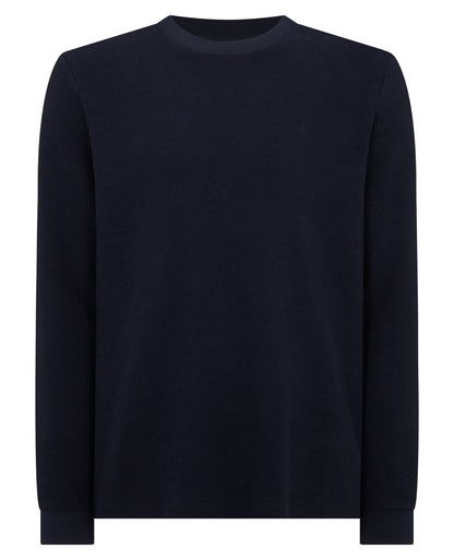 Man wearing a navy Tapered Fit Cotton Micro Waffle Sweatshirt