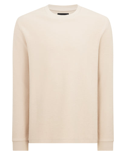 Man wearing a sand Tapered Fit Cotton Micro Waffle Sweatshirt
