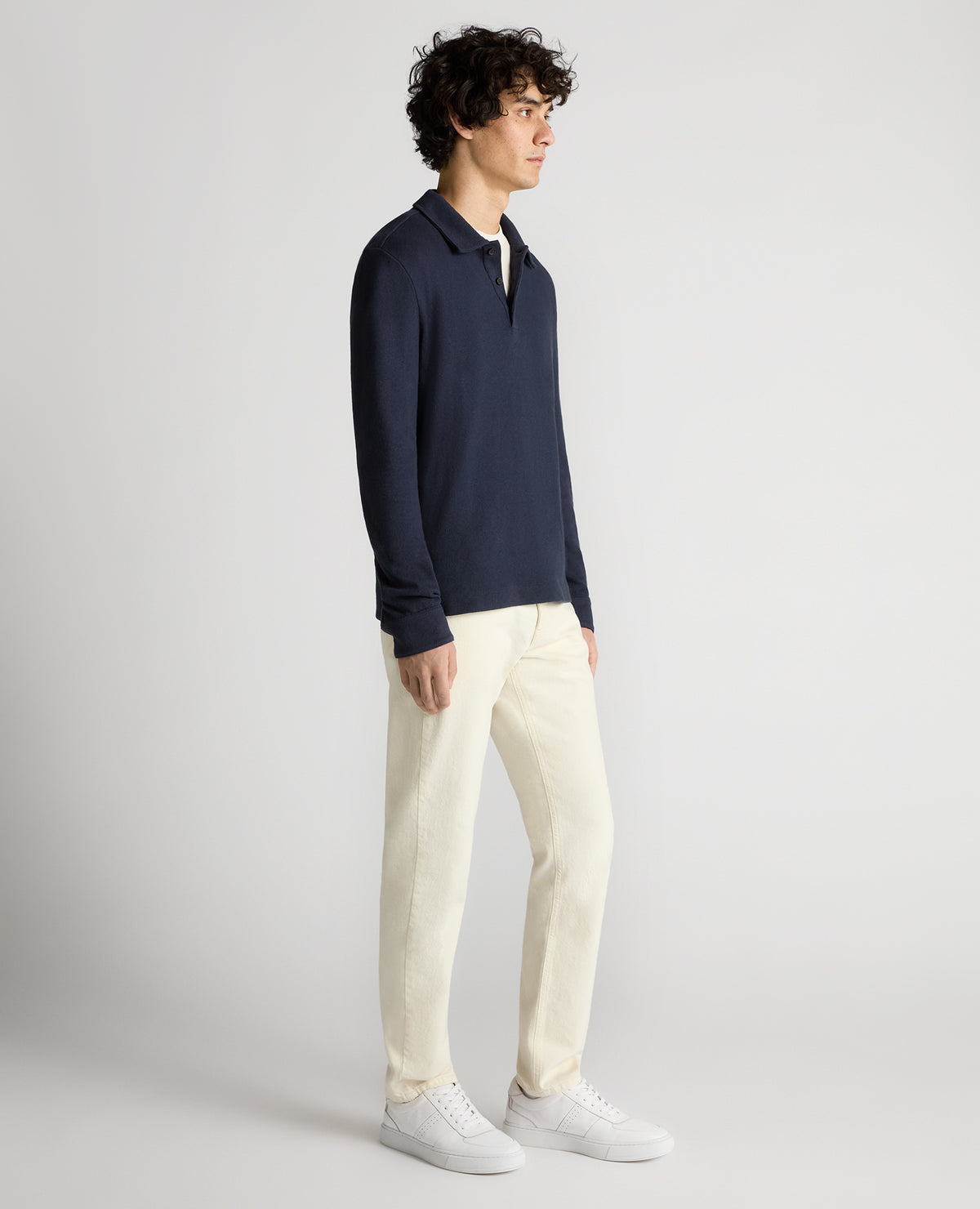 Man wearing a navy Relaxed Fit Cotton-Linen Polo