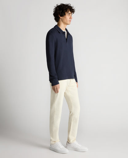 Man wearing a navy Relaxed Fit Cotton-Linen Polo
