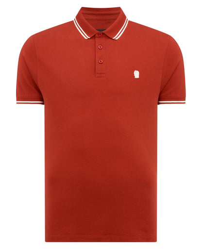 Man wearing a orange Tapered Fit Cotton-Stretch Polo Shirt