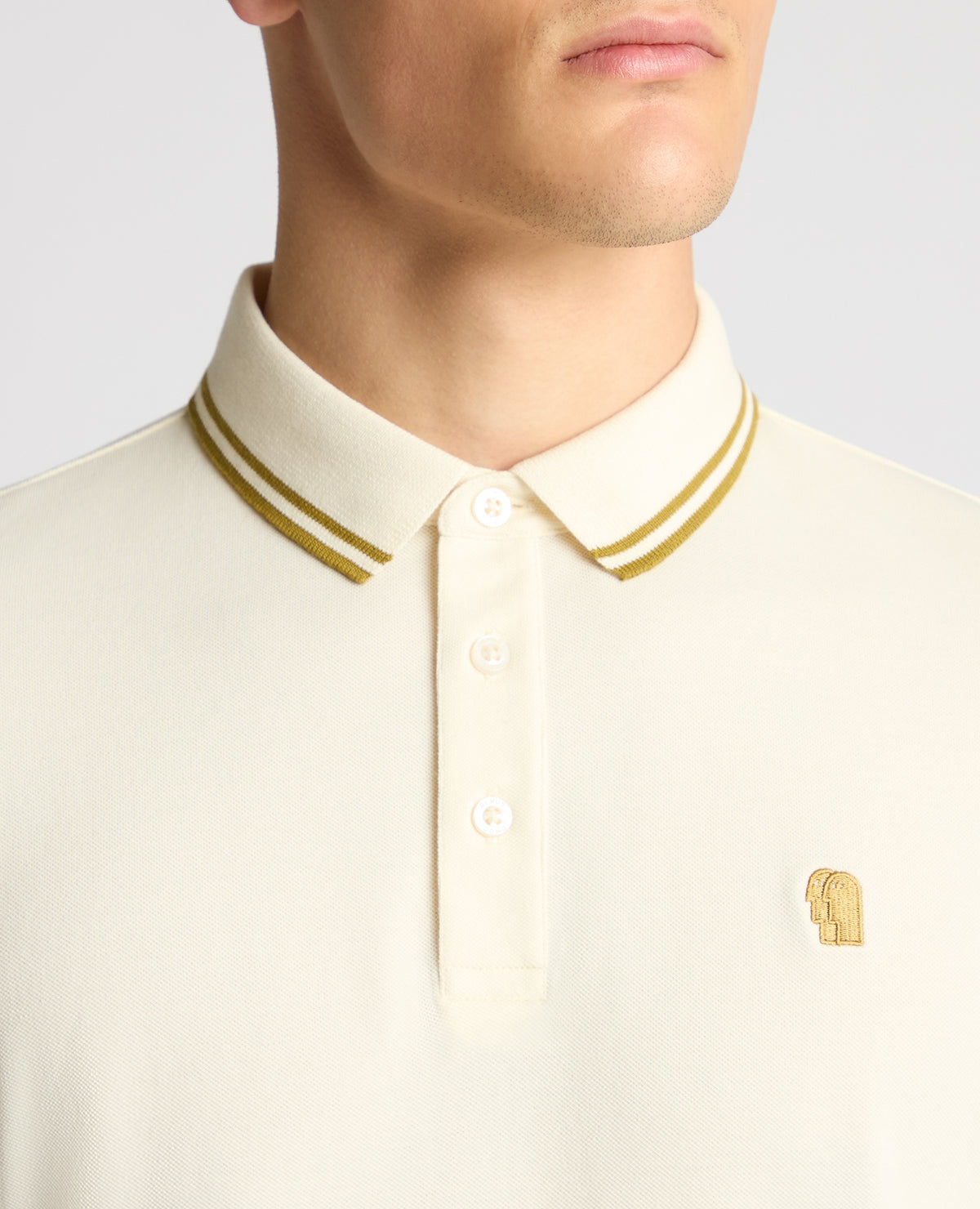 Man wearing a cream jumper