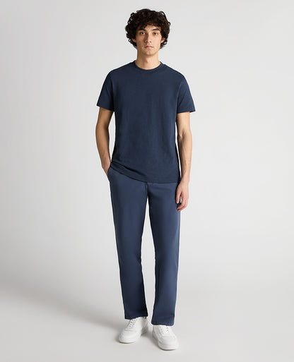 Man wearing a navy Tapered Fit Cotton Crew Neck Tee