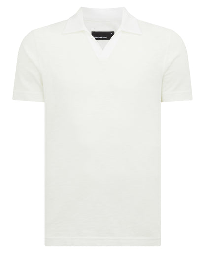 Man wearing a white Tapered Fit Open Collar Cotton Polo