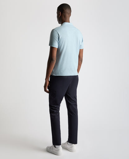 Man wearing a blue Tapered Fit Open Collar Cotton Polo
