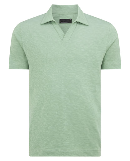 Man wearing a green Tapered Fit Open Collar Cotton Polo