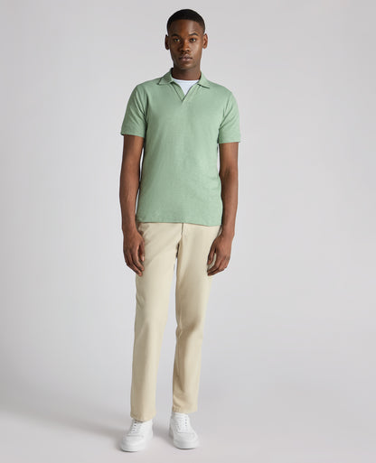 Man wearing a green Tapered Fit Open Collar Cotton Polo