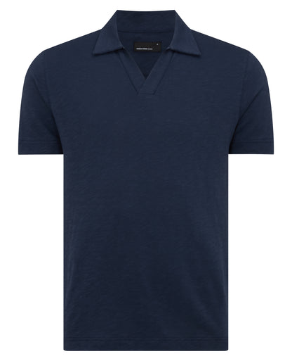 Man wearing a navy Tapered Fit Open Collar Cotton Polo