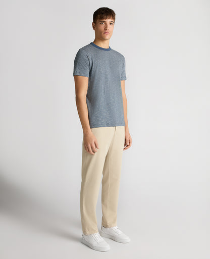 Man wearing a blue Tapered Fit Cotton-Linen T-Shirt