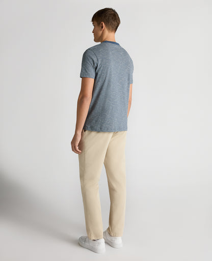 Man wearing a blue Tapered Fit Cotton-Linen T-Shirt