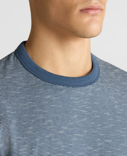 Man wearing a blue Tapered Fit Cotton-Linen T-Shirt