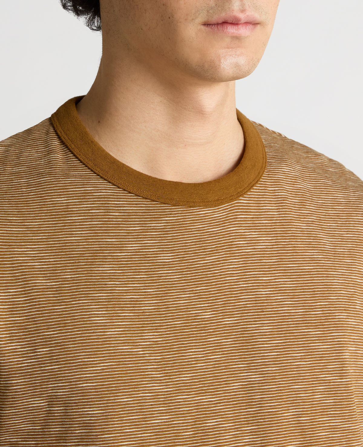 Man wearing a brown Tapered Fit Cotton-Linen T-Shirt