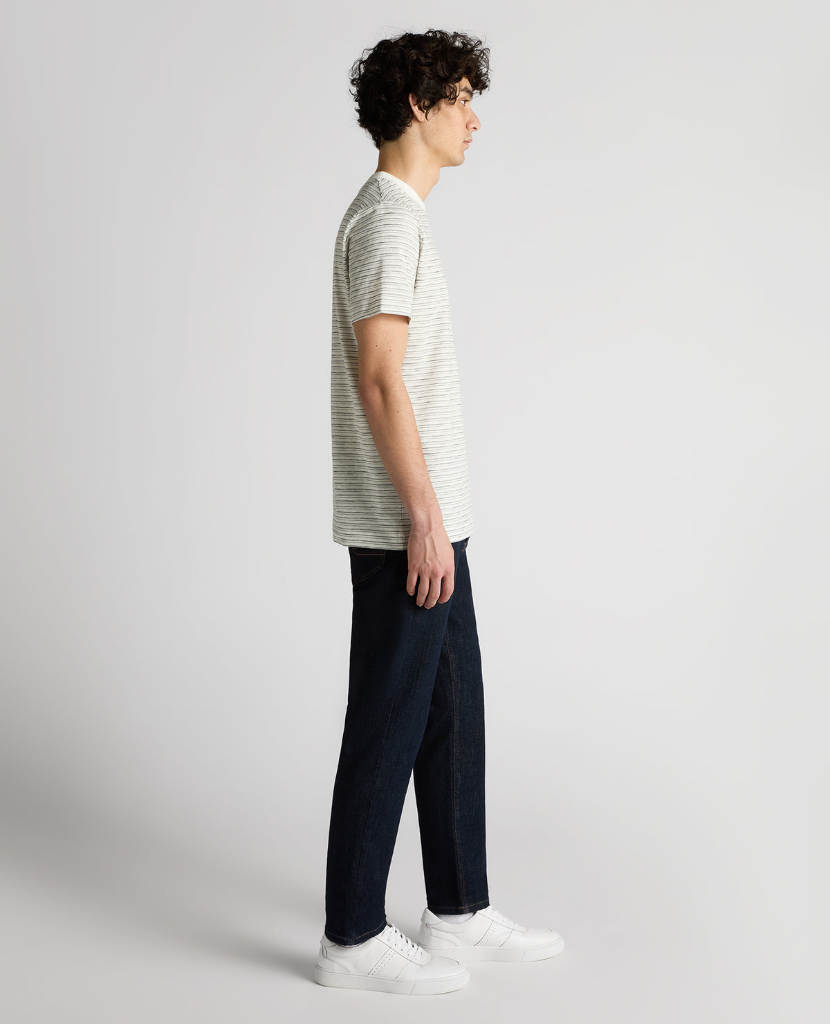 Man wearing a navy Relaxed Fit Cotton Stripe T-Shirt