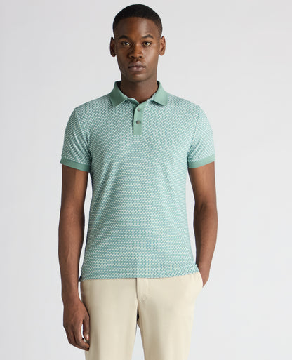 Man wearing a green Tapered Fit Cotton-Blend Polo Shirt