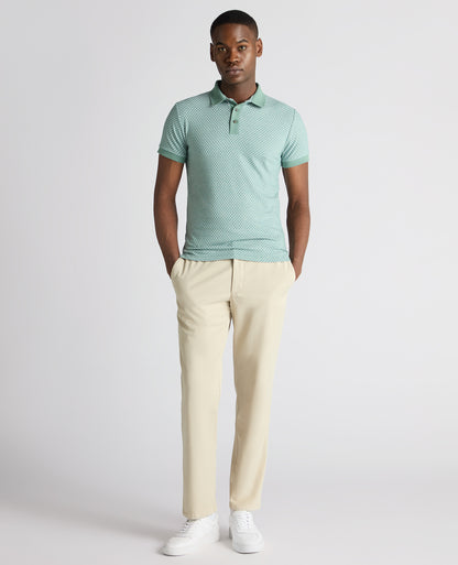 Man wearing a green Tapered Fit Cotton-Blend Polo Shirt