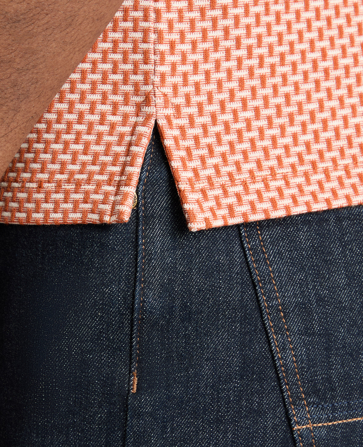 Man wearing a orange jumper