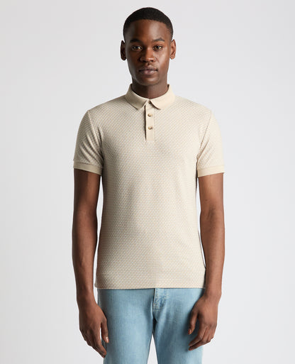 Man wearing a sand Tapered Fit Cotton-Blend Polo Shirt
