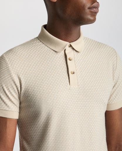 Man wearing a sand Tapered Fit Cotton-Blend Polo Shirt