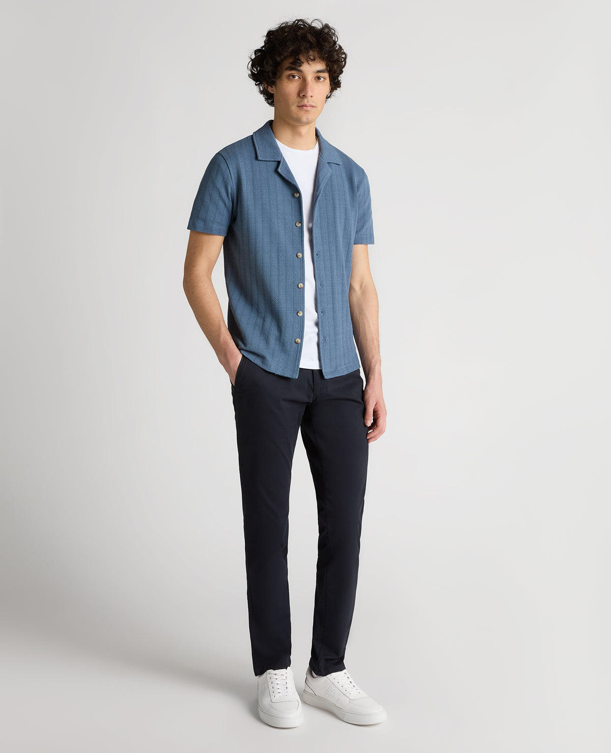 Man wearing a blue Relaxed Fit Cotton-Linen Cuban Collar Shirt