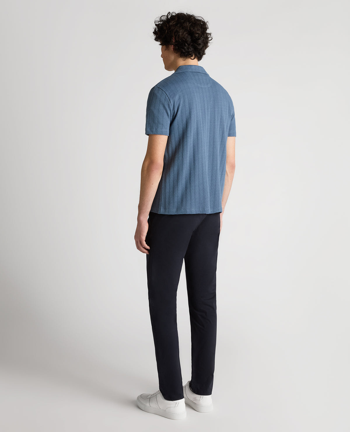 Man wearing a blue Relaxed Fit Cotton-Linen Cuban Collar Shirt