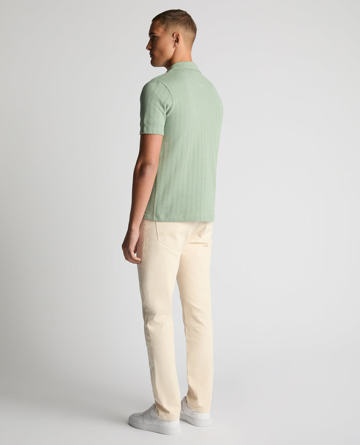 Man wearing a green Relaxed Fit Cotton-Linen Cuban Collar Shirt