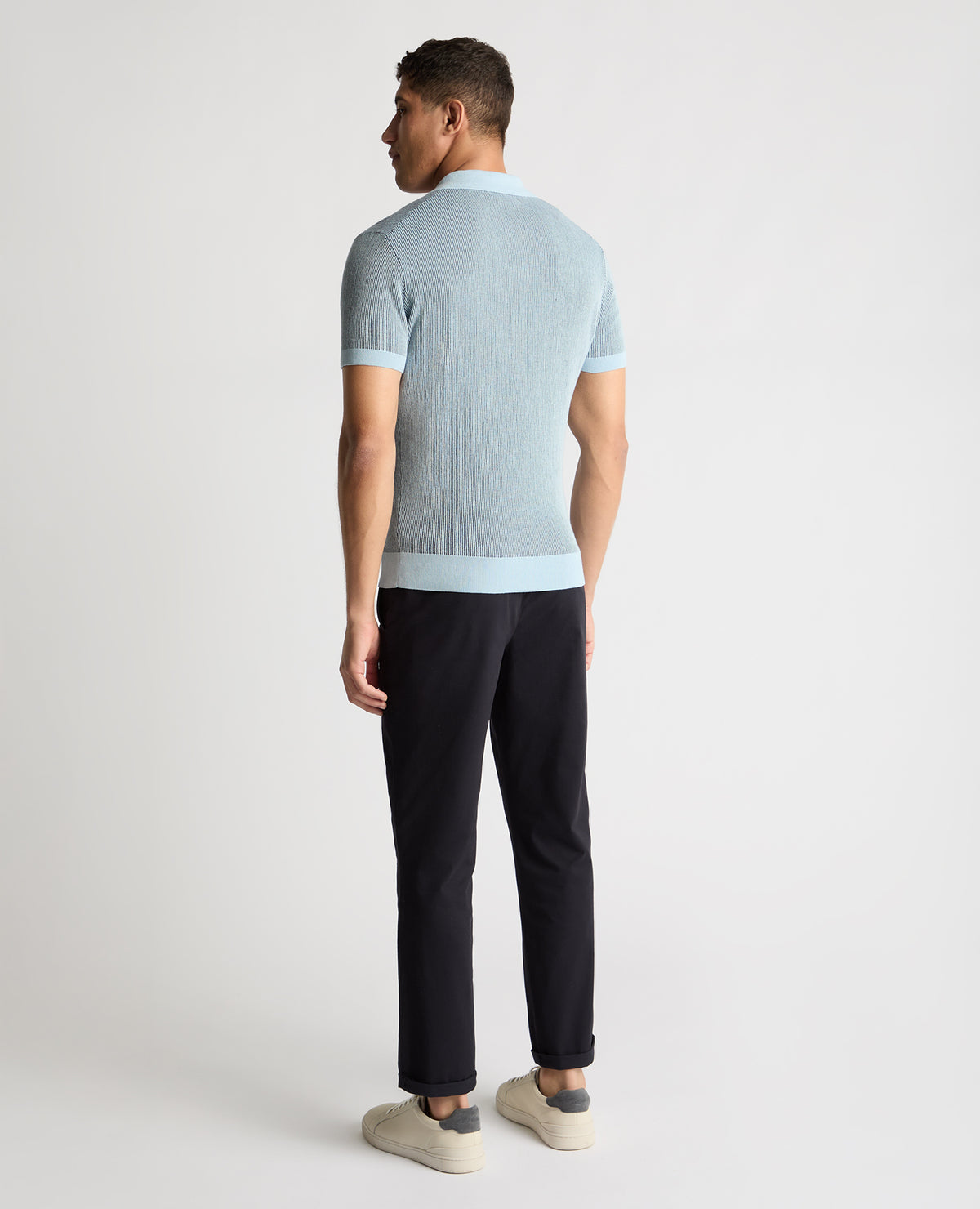 Man wearing a blue jumper