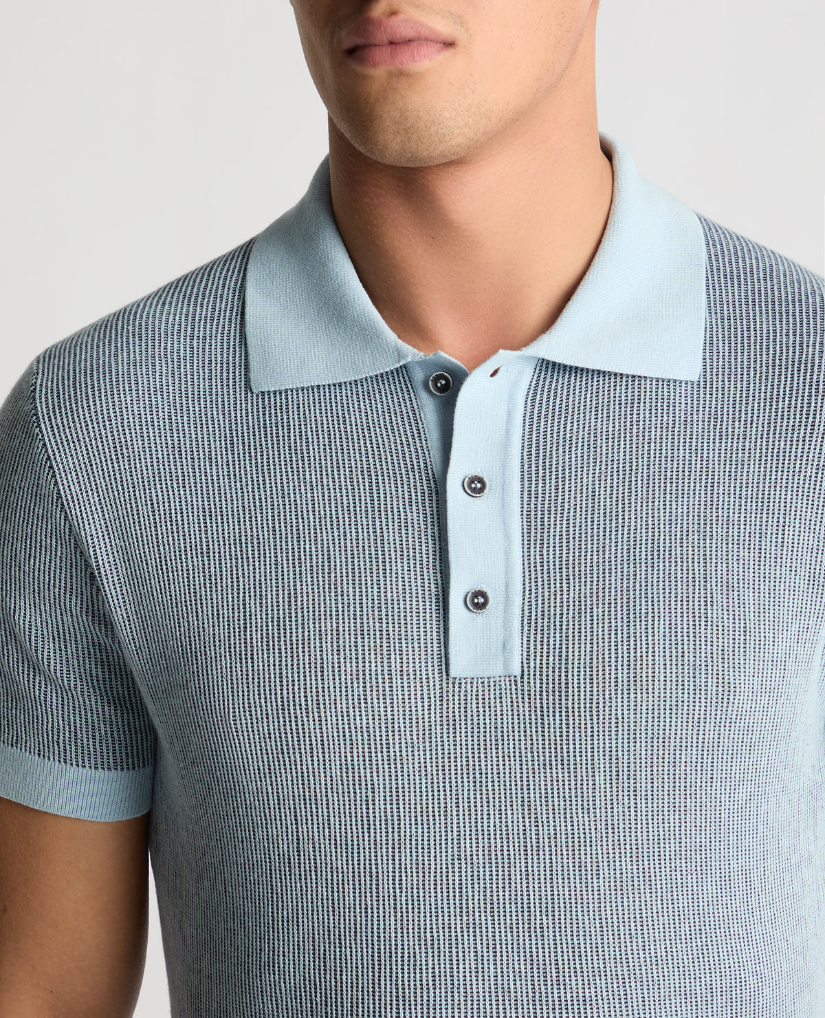Man wearing a blue jumper
