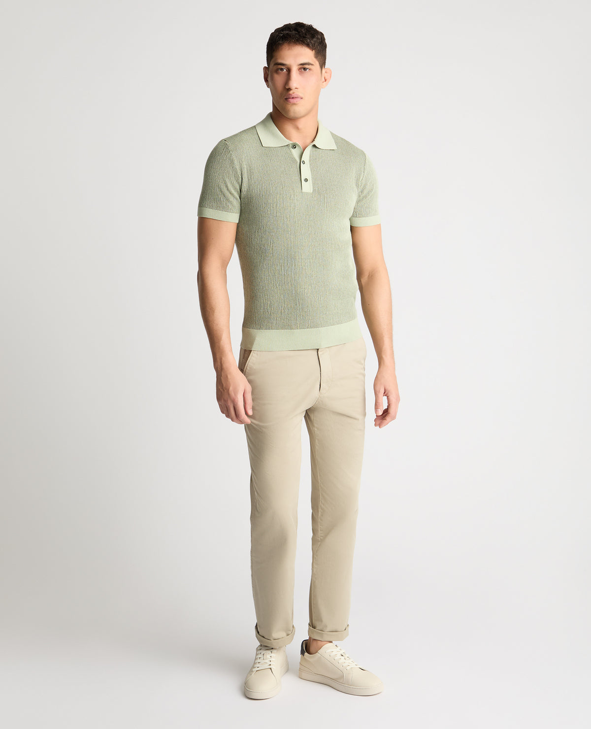 Man wearing a green jumper