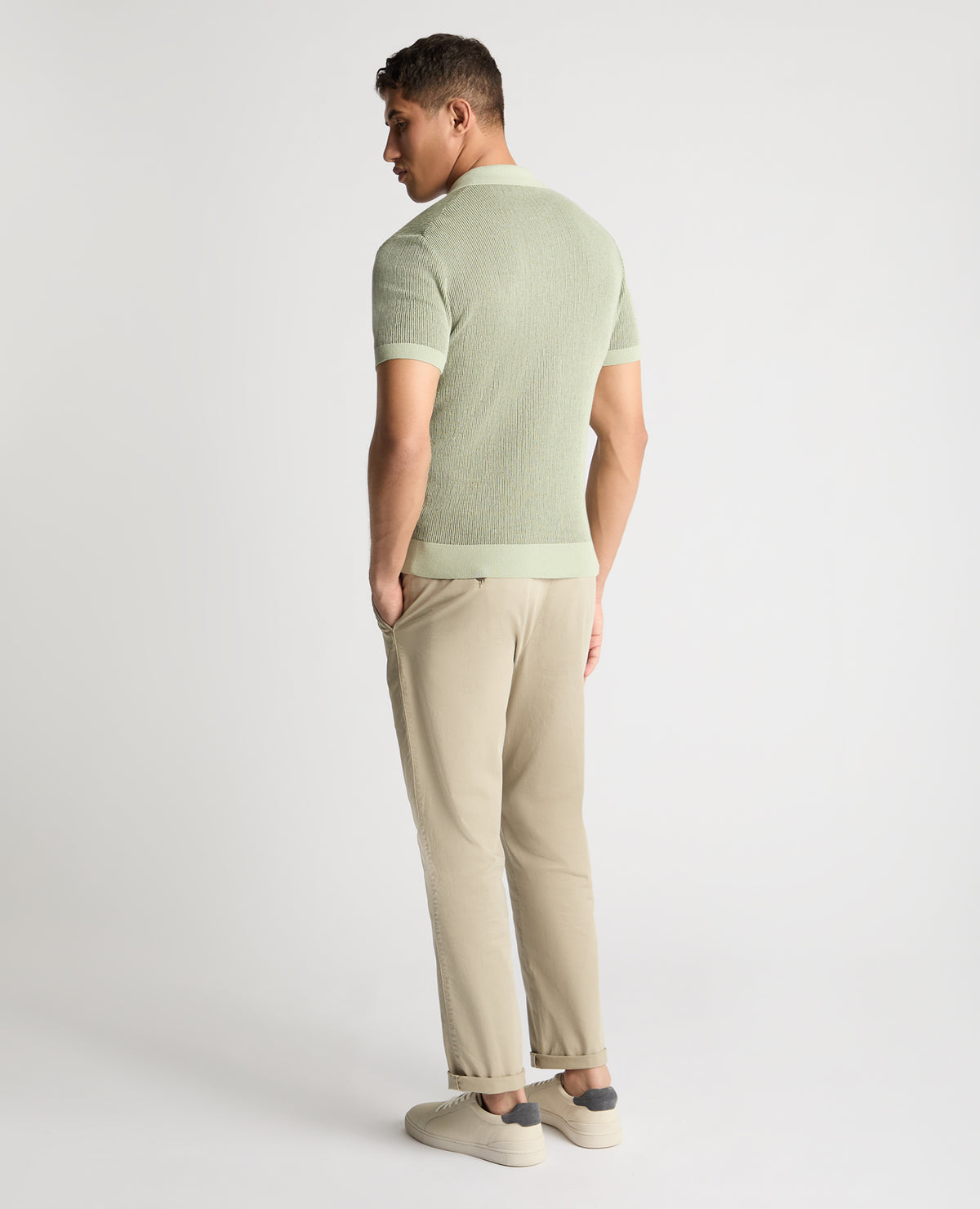 Man wearing a green jumper