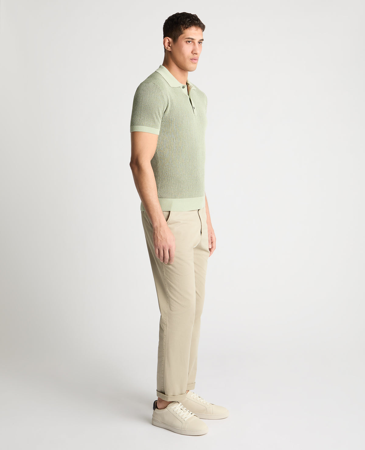 Man wearing a green jumper