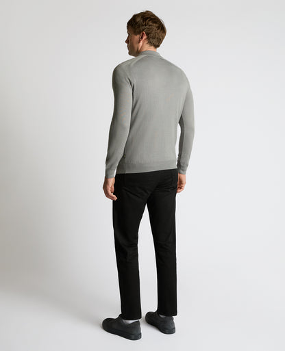 Man wearing a grey Merino Wool-Blend Knit Polo