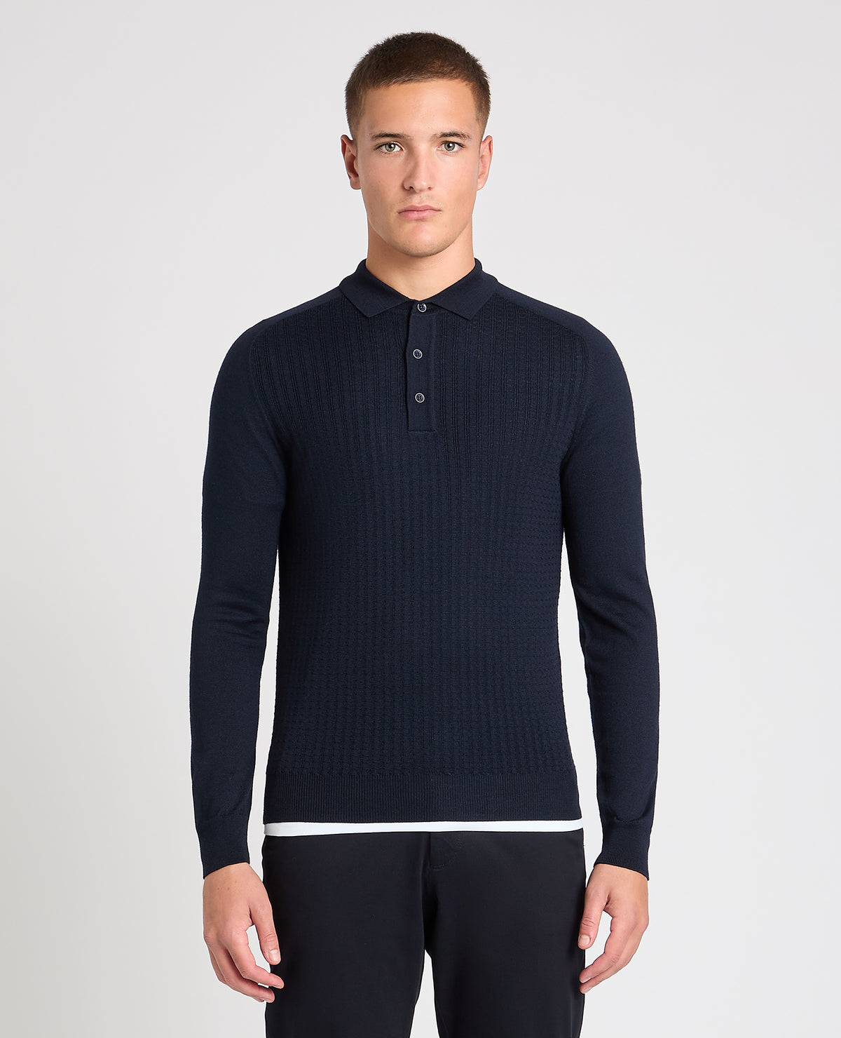 Man wearing a navy jumper