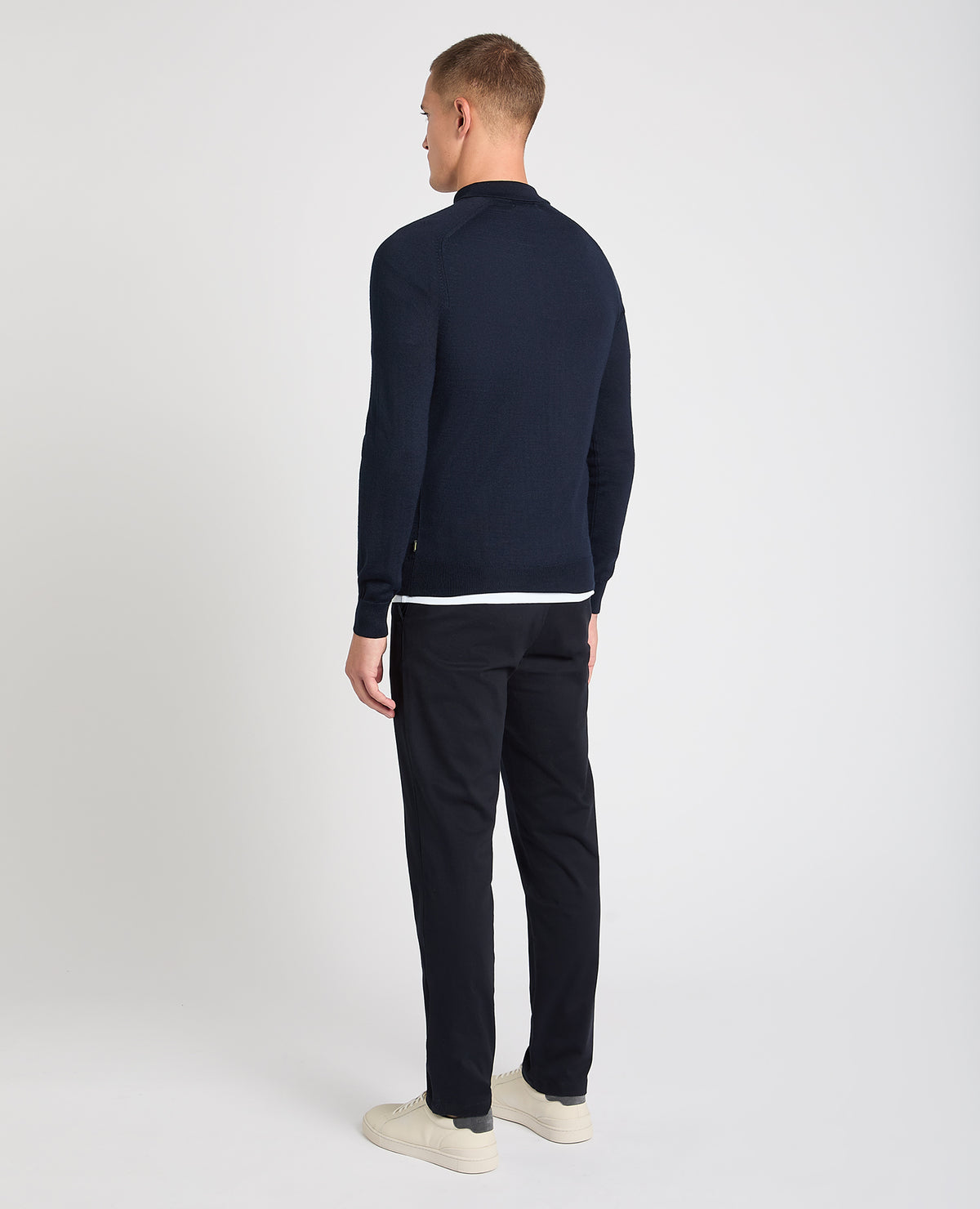 Man wearing a navy jumper