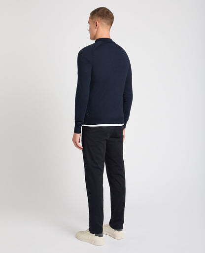 Man wearing a navy jumper