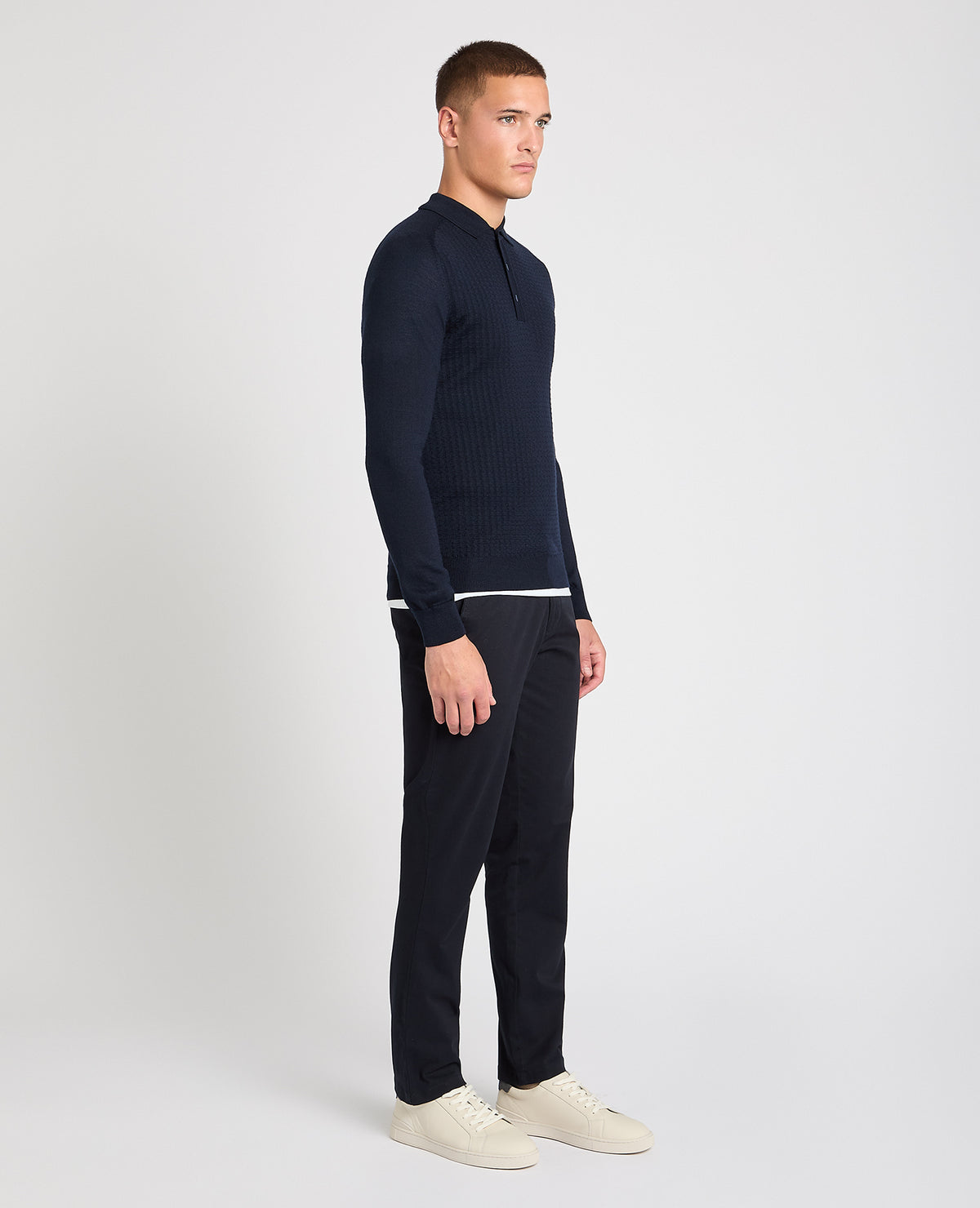 Man wearing a navy jumper