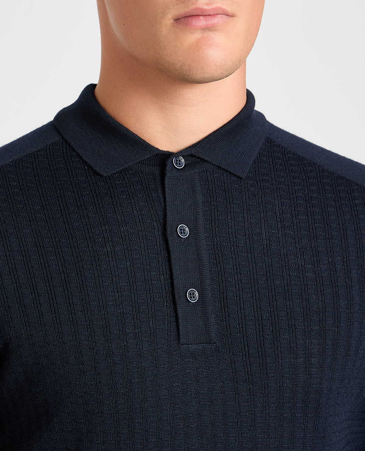 Man wearing a navy jumper