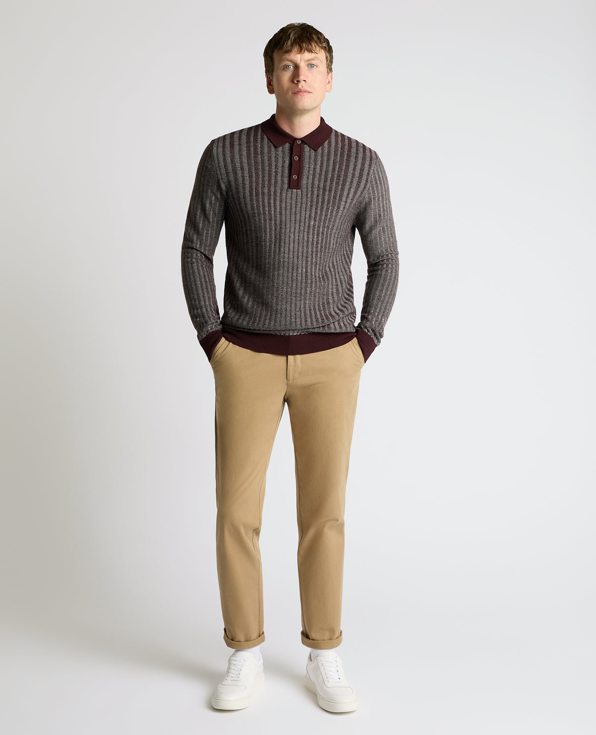 Man wearing a red Plaited Stripe Wool-Blend Knit Polo