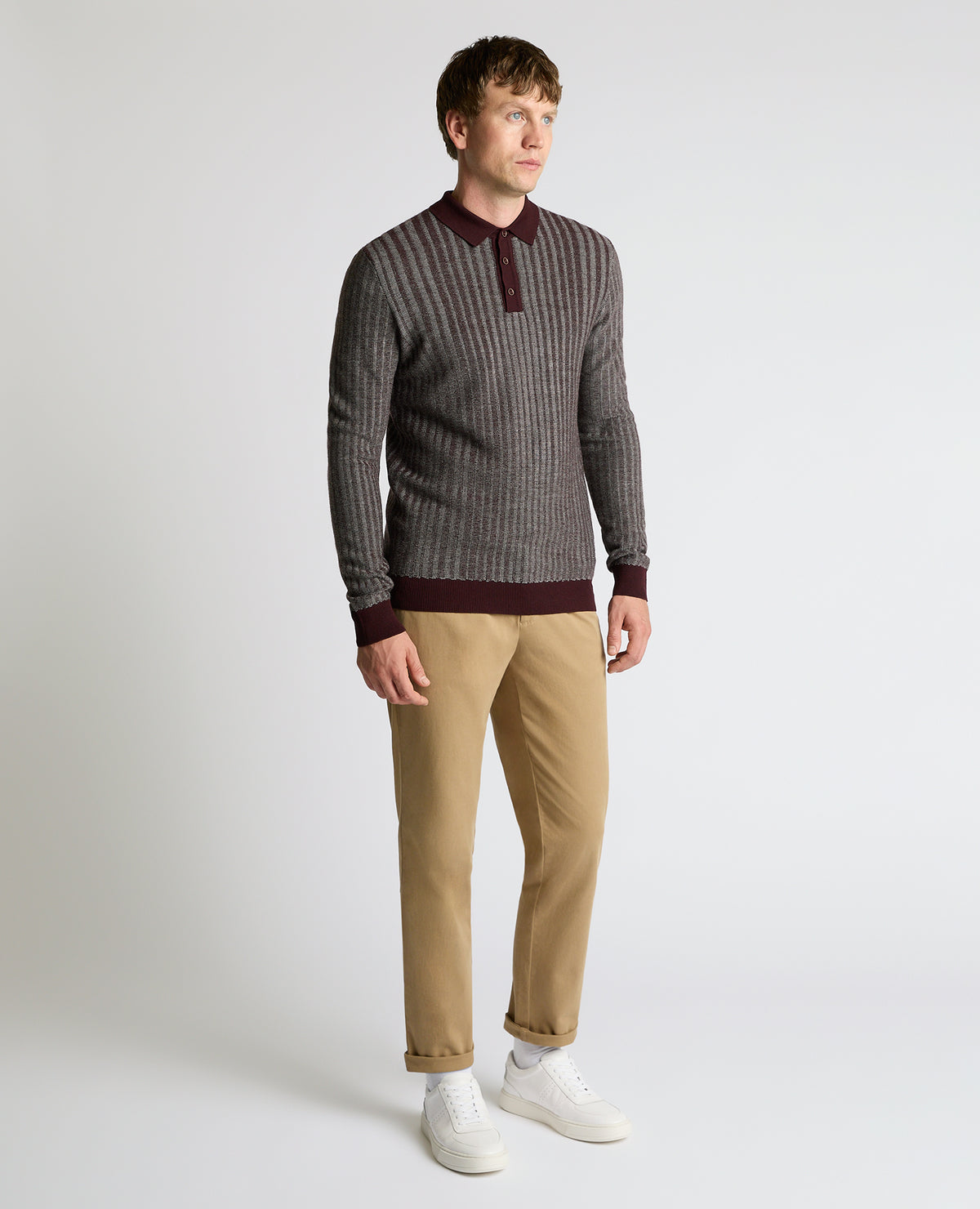 Man wearing a red Plaited Stripe Wool-Blend Knit Polo