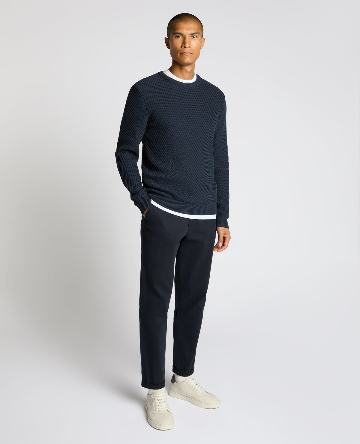 Man wearing a blue Cotton Interest Fabric Sweater