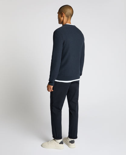 Man wearing a blue Cotton Interest Fabric Sweater