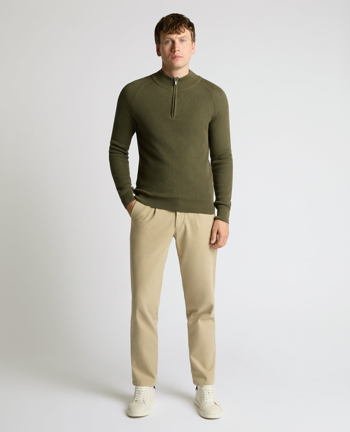 Man wearing a green Cotton Half-Zip Knit Sweater