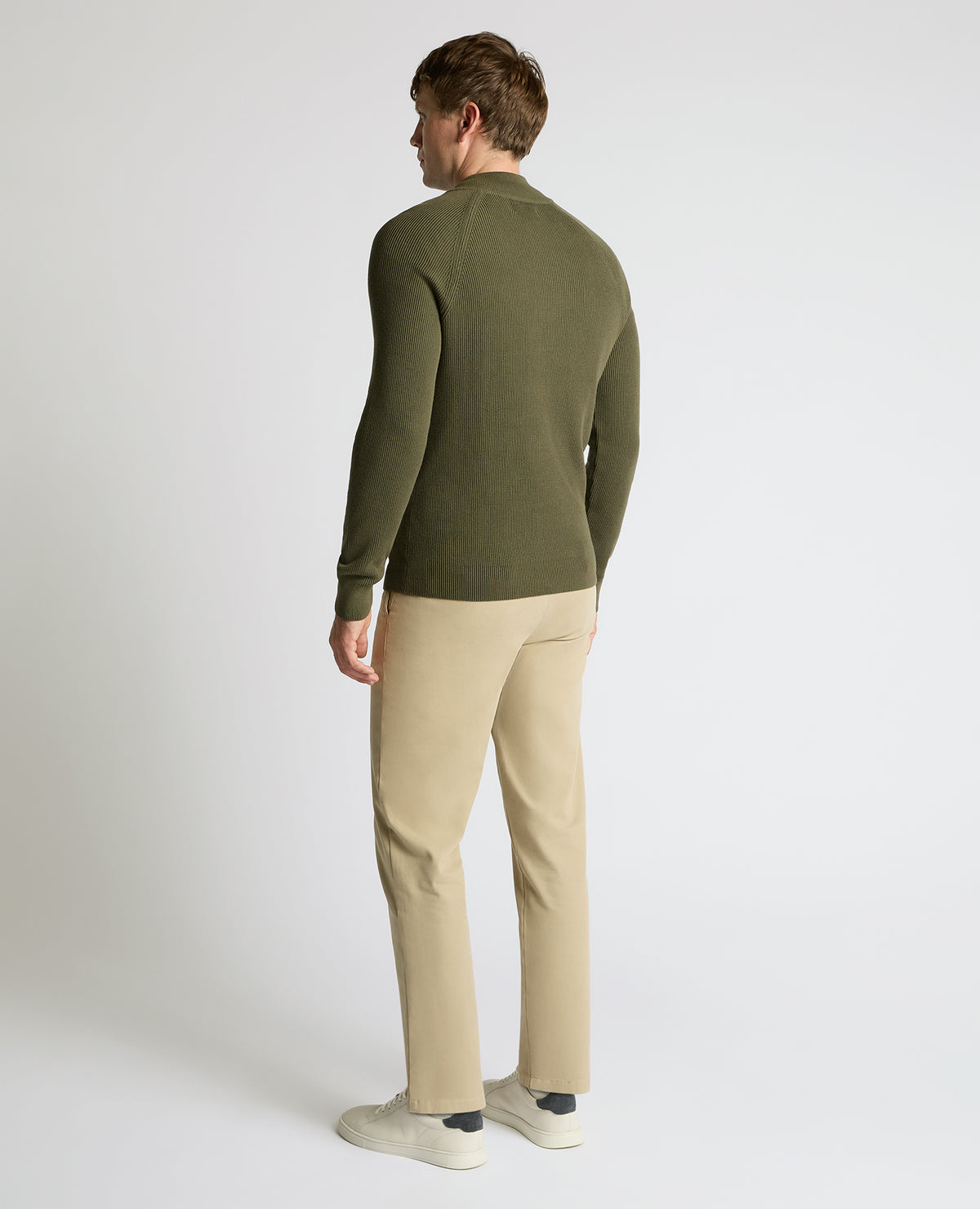 Man wearing a green Cotton Half-Zip Knit Sweater