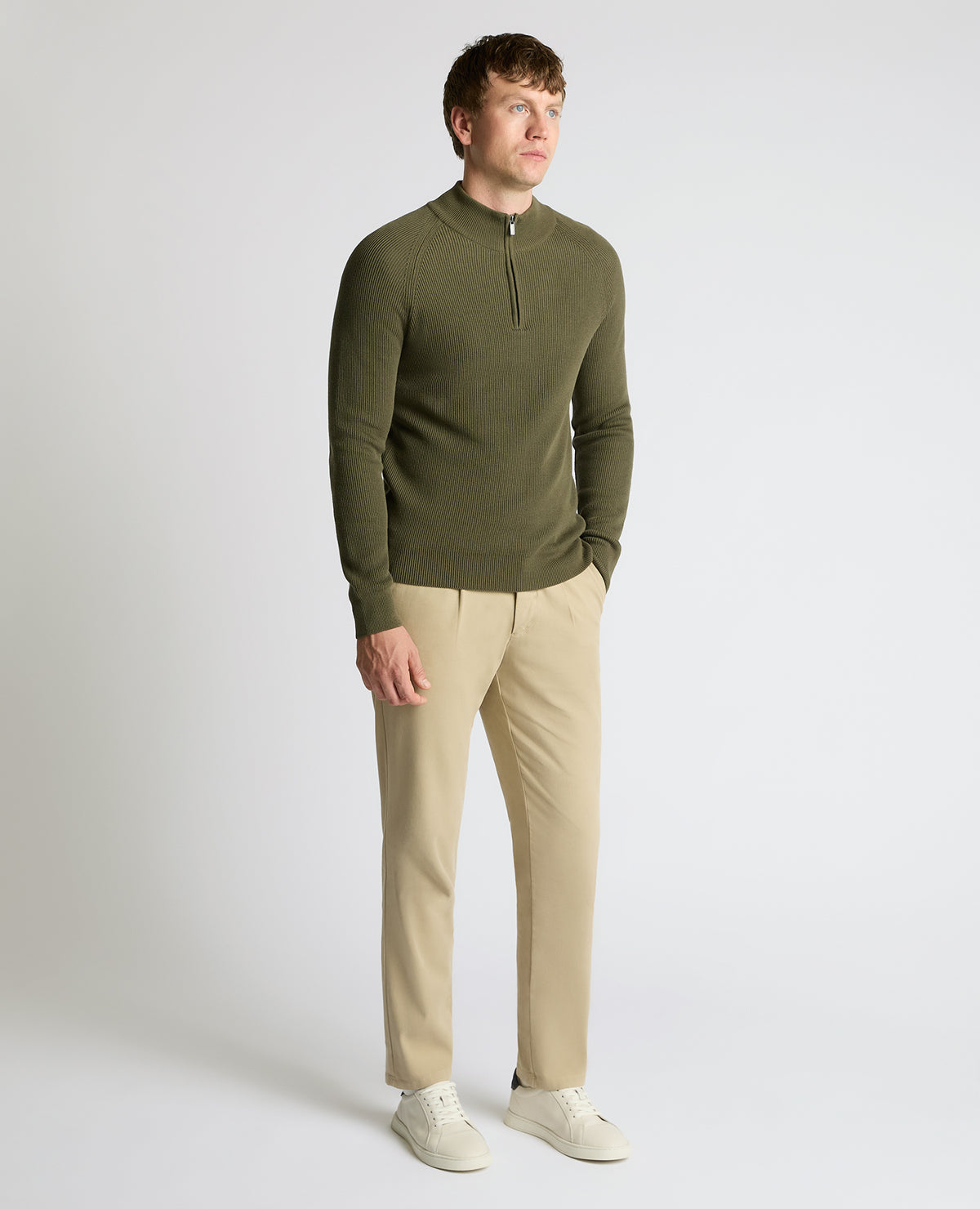 Man wearing a green Cotton Half-Zip Knit Sweater