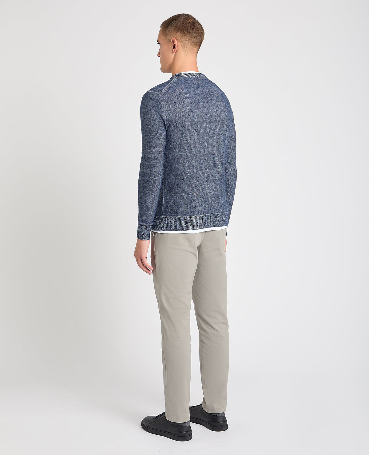 Man wearing a blue jumper