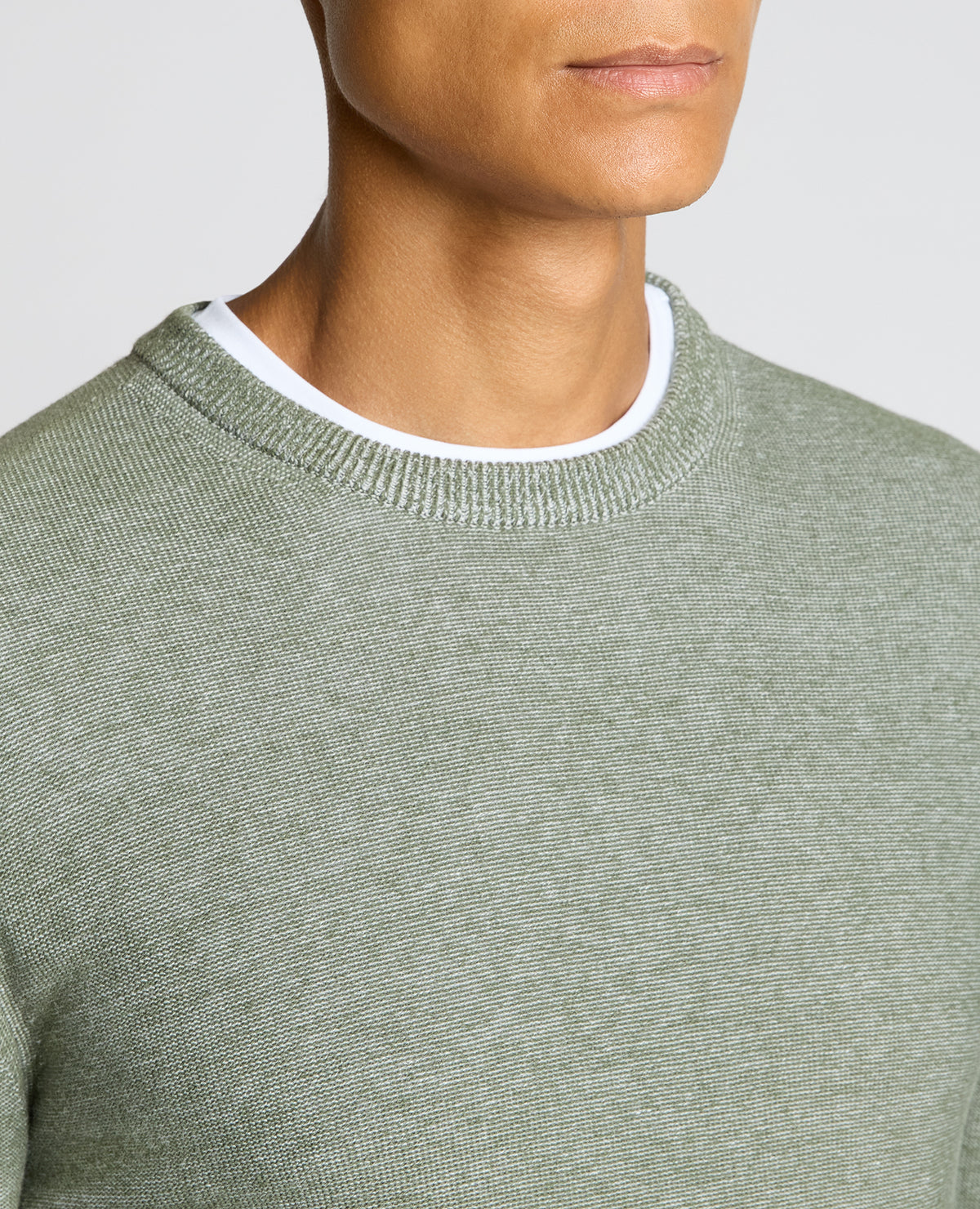 Man wearing a green Two-Tone Knit Sweater