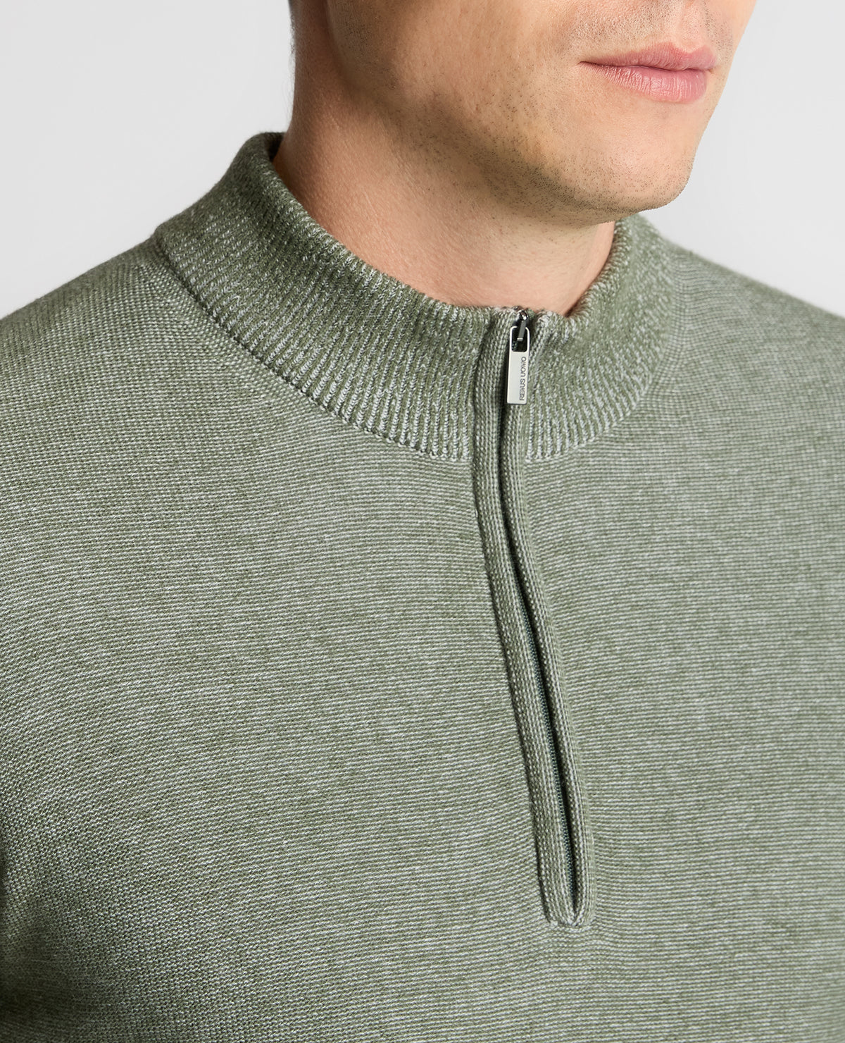 Man wearing a green Two-Tone Half-Zip Knit Sweater
