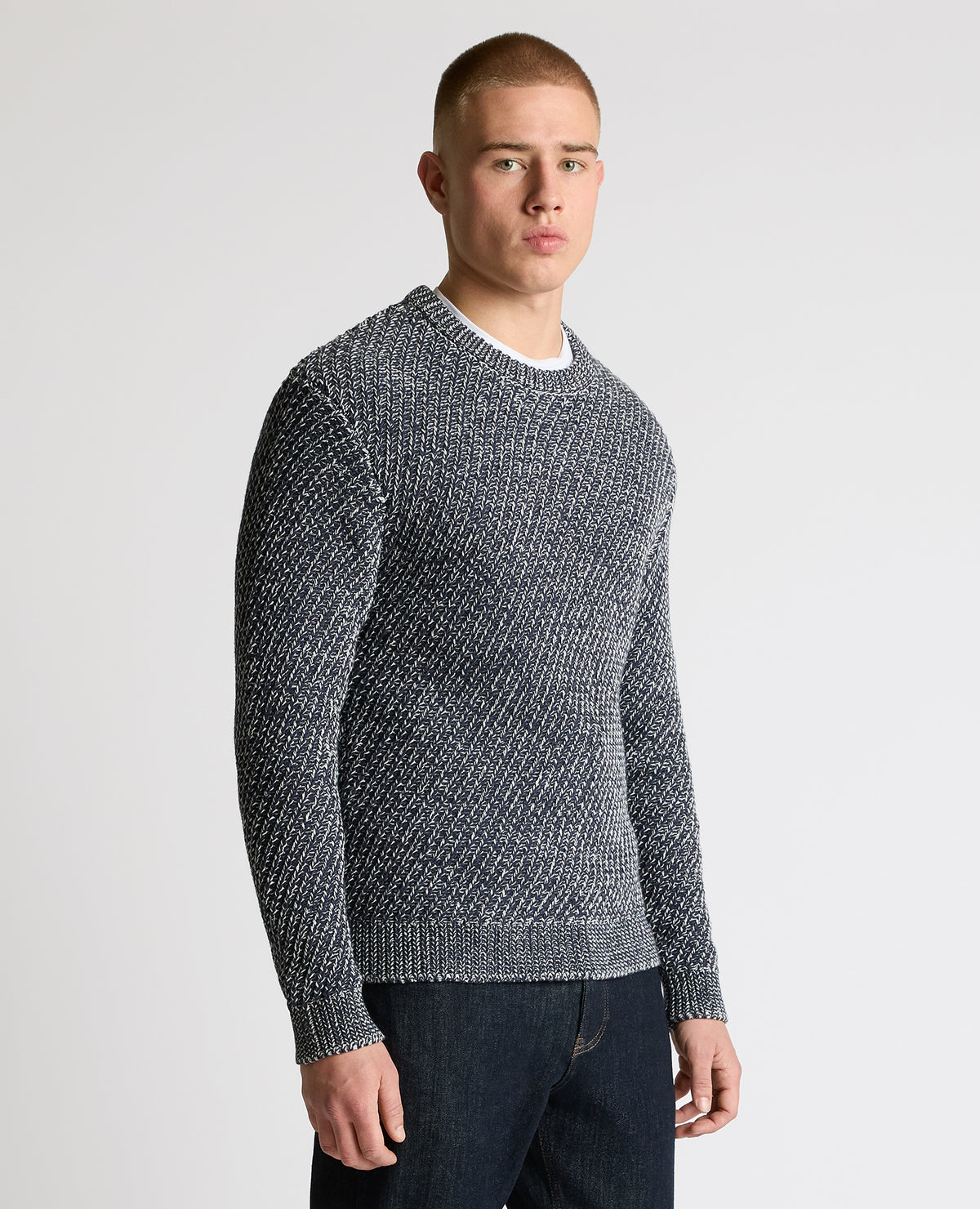 Man wearing a blue Two-Tone Cotton-Blend Knit Sweater