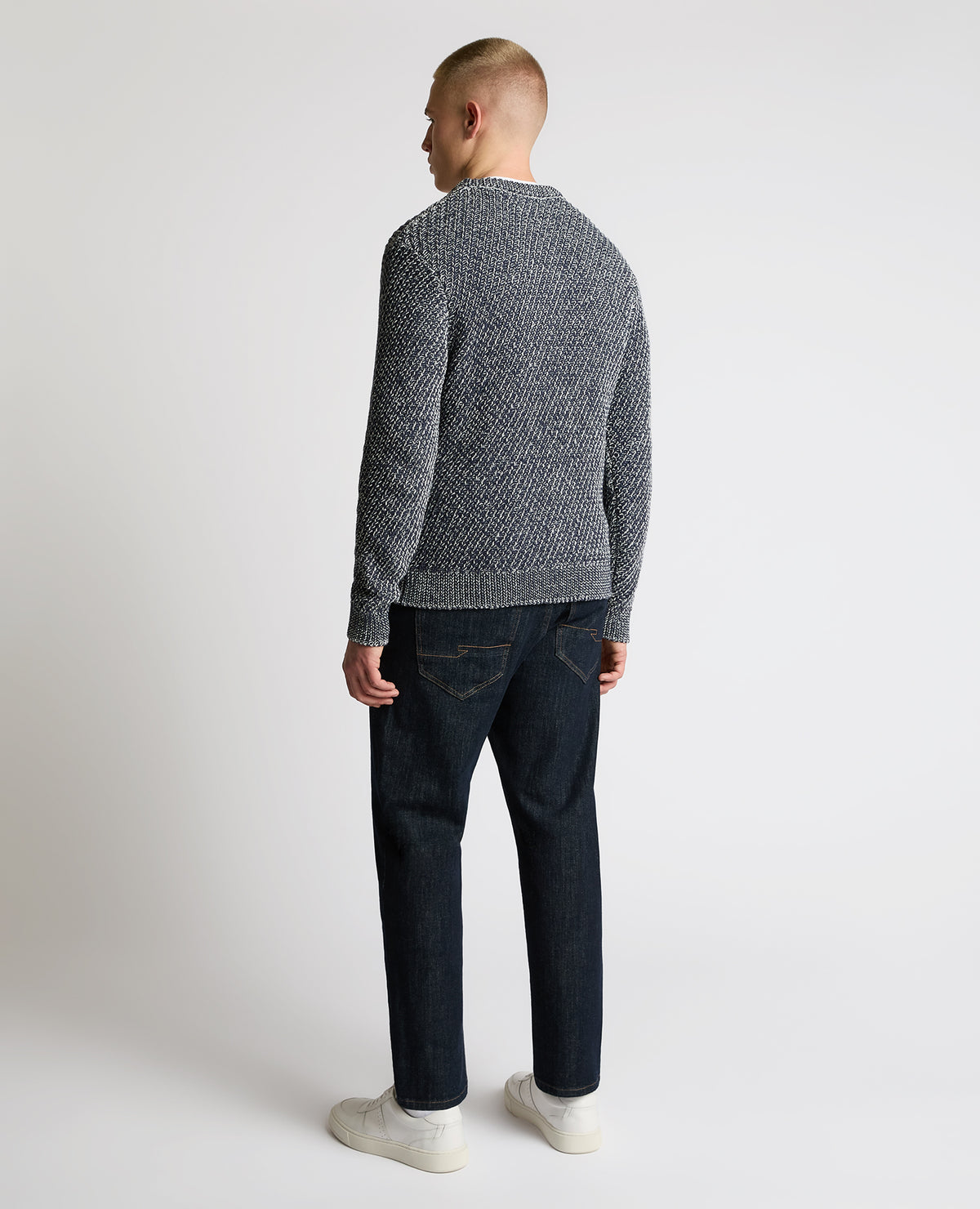 Man wearing a blue Two-Tone Cotton-Blend Knit Sweater